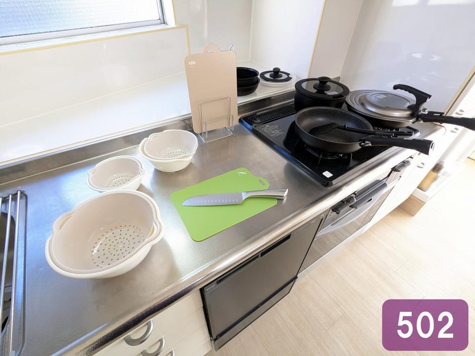 Kitchen or kitchenette, stove