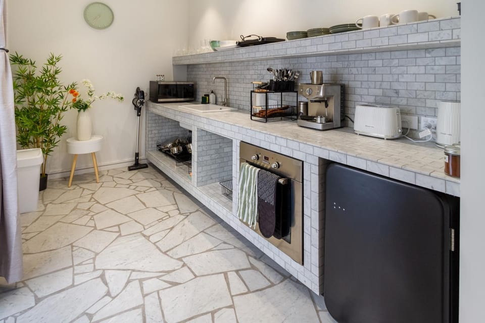 Kitchen or kitchenette, oven