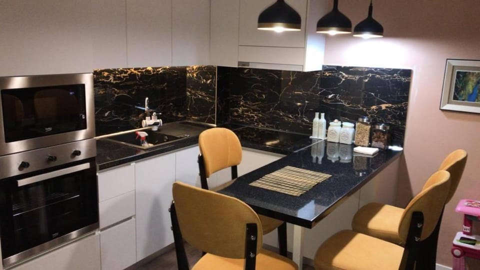 Kitchen or kitchenette, Dining area, microwave, oven, stove
