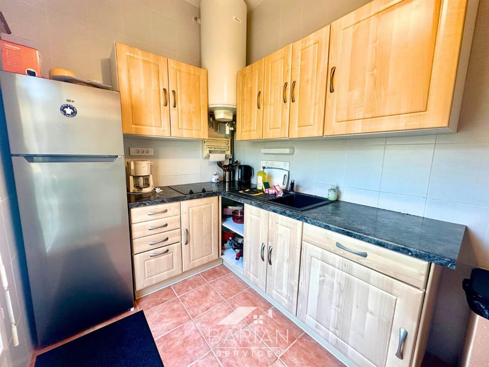 Kitchen or kitchenette, stove