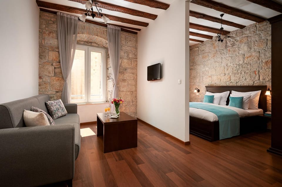 Bed, Living room, Seating area, Bedroom