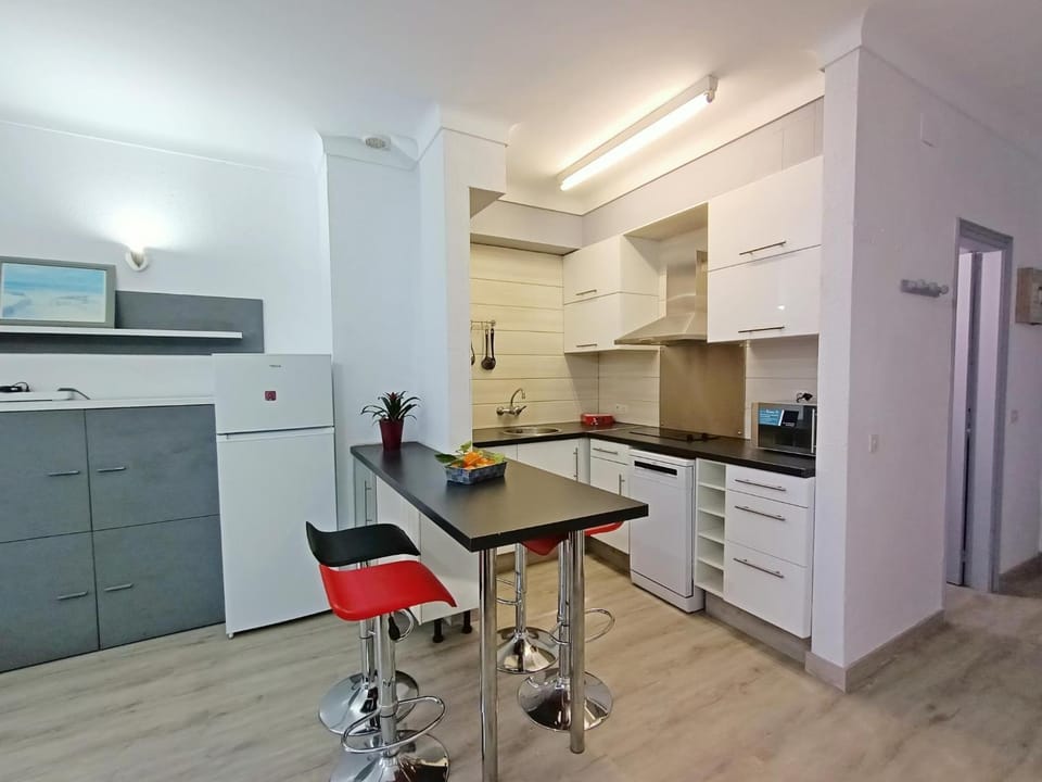 Kitchen or kitchenette, Dining area, dishwasher, stove, toaster