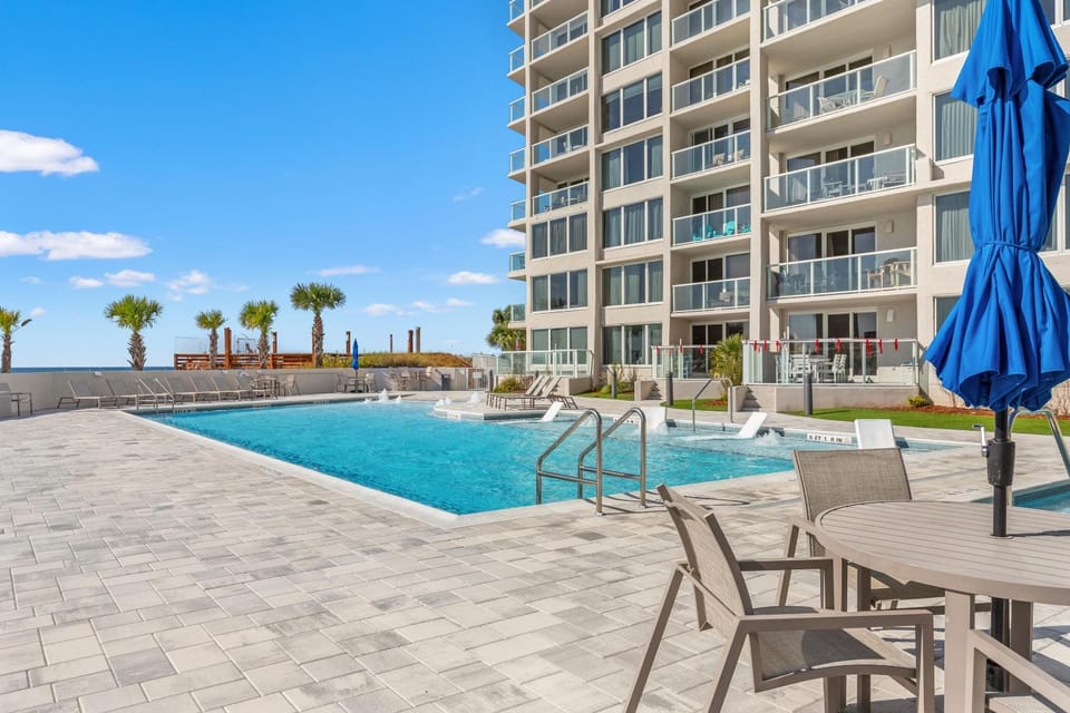 Property building, Patio, Day, View (from property/room), Balcony/Terrace, Seating area, Pool view, Area and facilities, Swimming pool, sunbed