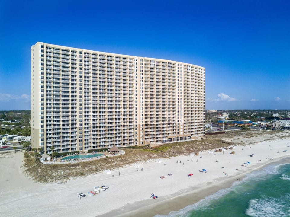 Property building, Nearby landmark, Day, Natural landscape, Bird's eye view, Beach, Sea view, sunbed