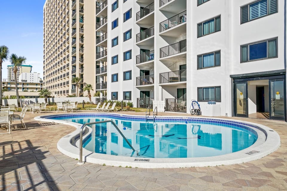 Property building, People, People, People, Natural landscape, Balcony/Terrace, Guests, Guests, Guests, Pool view, Area and facilities, Swimming pool, children, children, children, young children, young children, young children, older children, older children, older children, group of guests, group of guests, group of guests, Family, Family, Family, sunbed