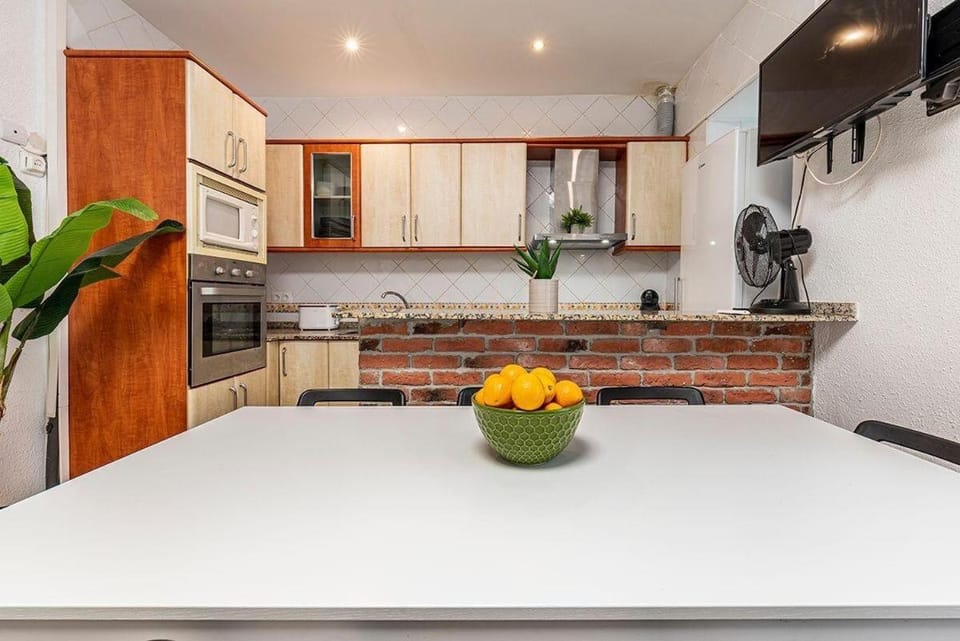Kitchen or kitchenette, oven