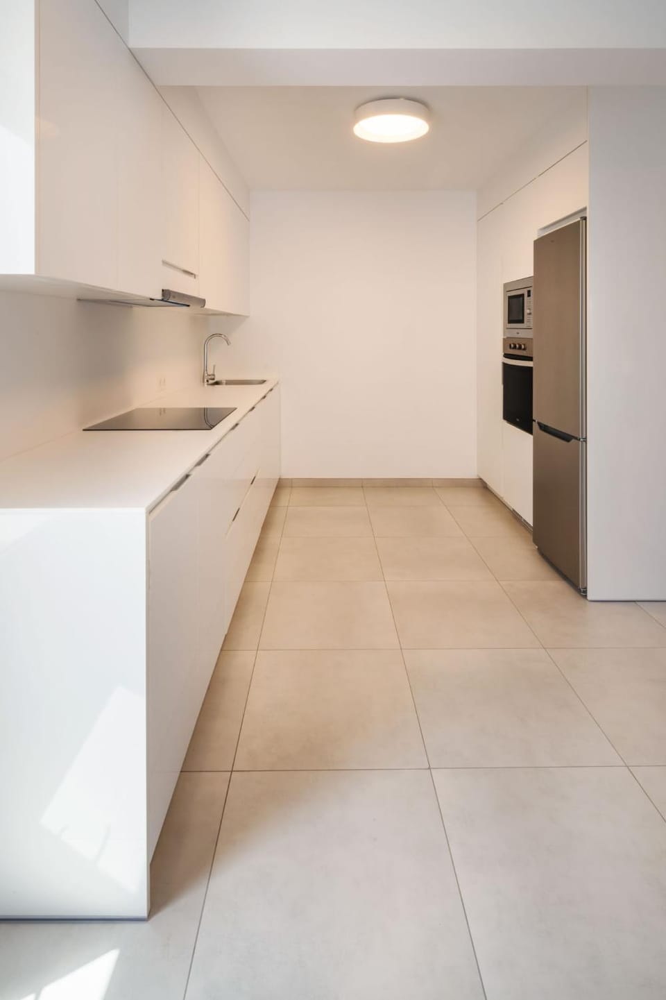 Kitchen or kitchenette, dishwasher, oven, stove