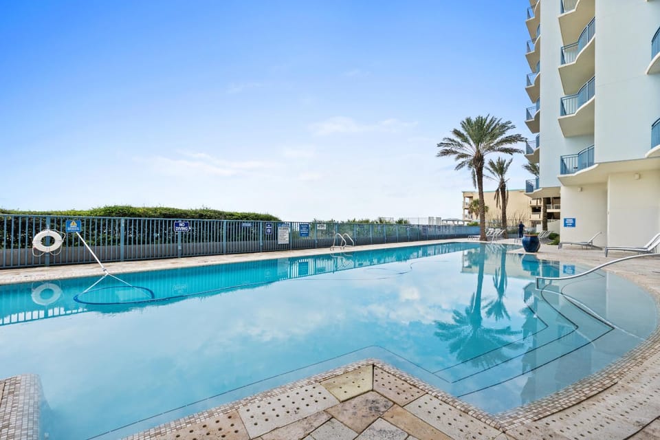 Property building, Day, Natural landscape, Pool view, Swimming pool, Swimming pool, sunbed