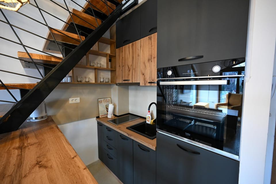 Kitchen or kitchenette, oven, stove