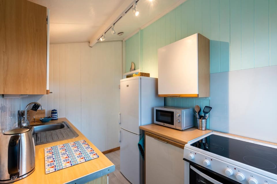 Kitchen or kitchenette, oven, stove, toaster