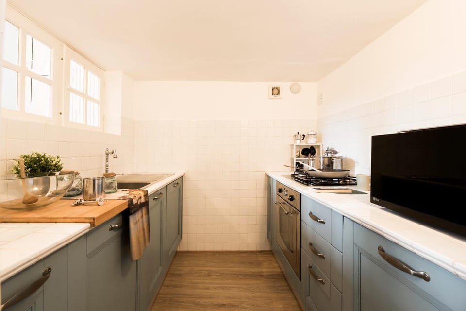 Kitchen or kitchenette, stove