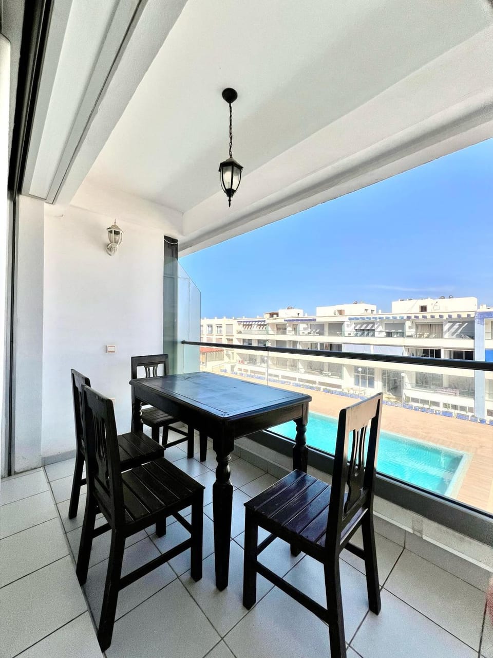 View (from property/room), Balcony/Terrace, Seating area, Dining area, Pool view, Sea view, Swimming pool