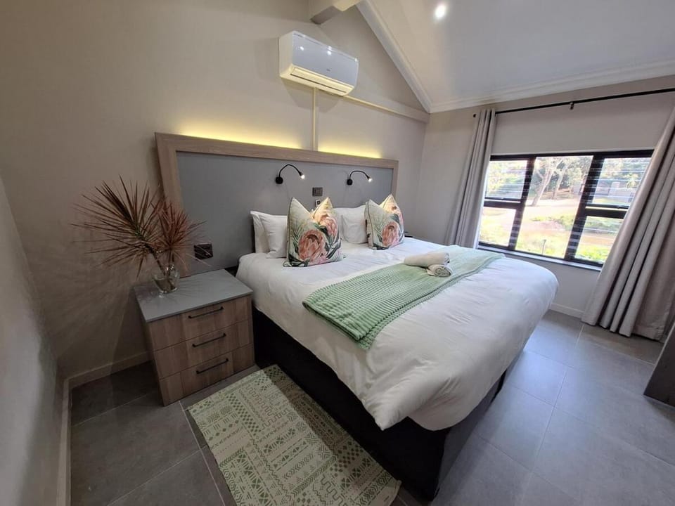 Bed, Photo of the whole room, Bedroom, towels, air conditioner