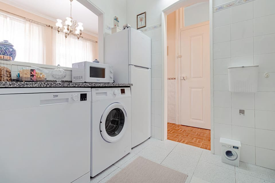 Kitchen or kitchenette, dishwasher, washing machine, dryer