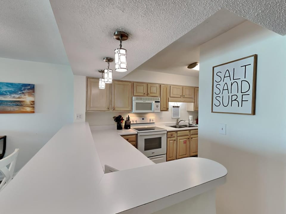 Kitchen or kitchenette, microwave, oven, stove, kitchen