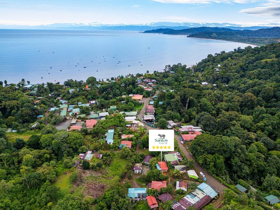 Property building, Nearby landmark, Property logo or sign, Neighbourhood, Natural landscape, Bird's eye view, Beach, Mountain view, Street view