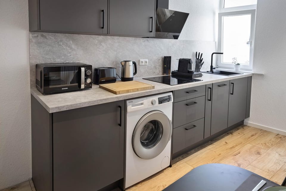 Coffee/tea facilities, Kitchen or kitchenette, dishwasher, stove, toaster, washing machine, kitchen