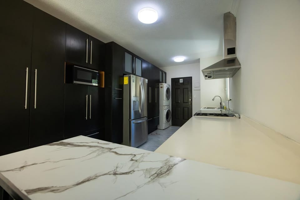 Kitchen or kitchenette, oven