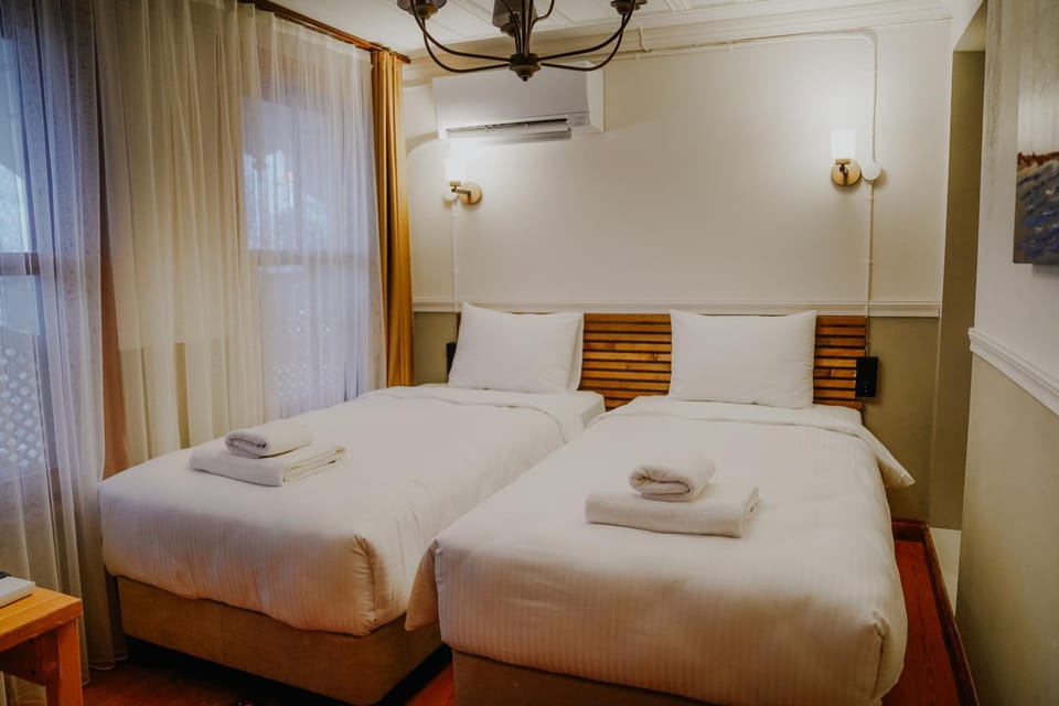 Bed, Photo of the whole room, Bedroom, towels, air conditioner
