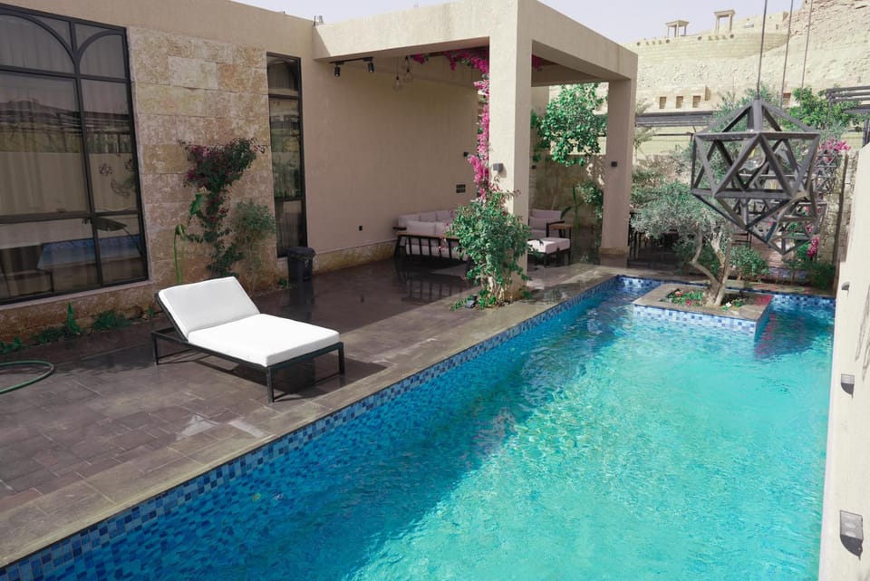 Property building, Patio, Day, Pool view, Swimming pool, sunbed