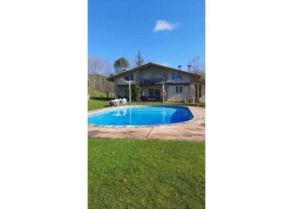 Property building, Living room, Swimming pool