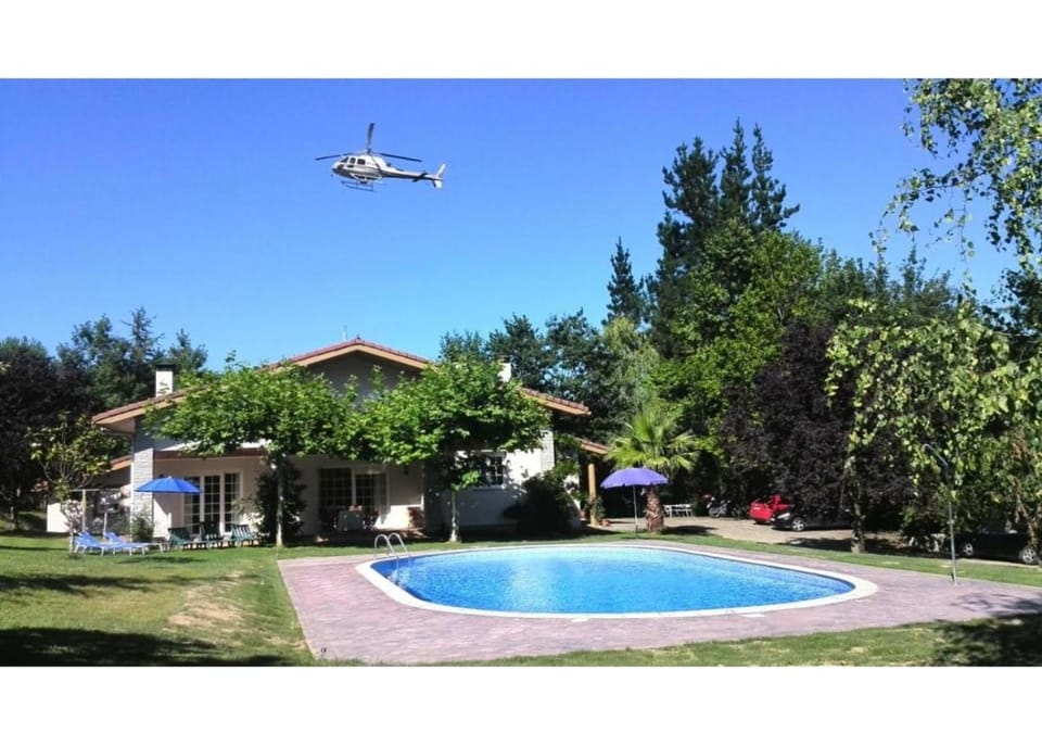 Property building, Living room, Swimming pool