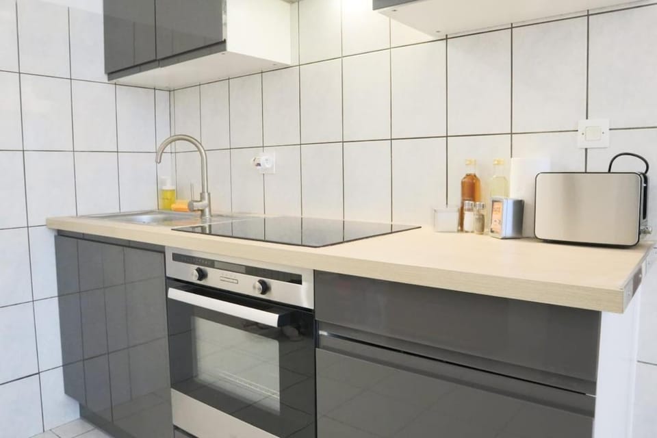 Kitchen or kitchenette, stove, toaster