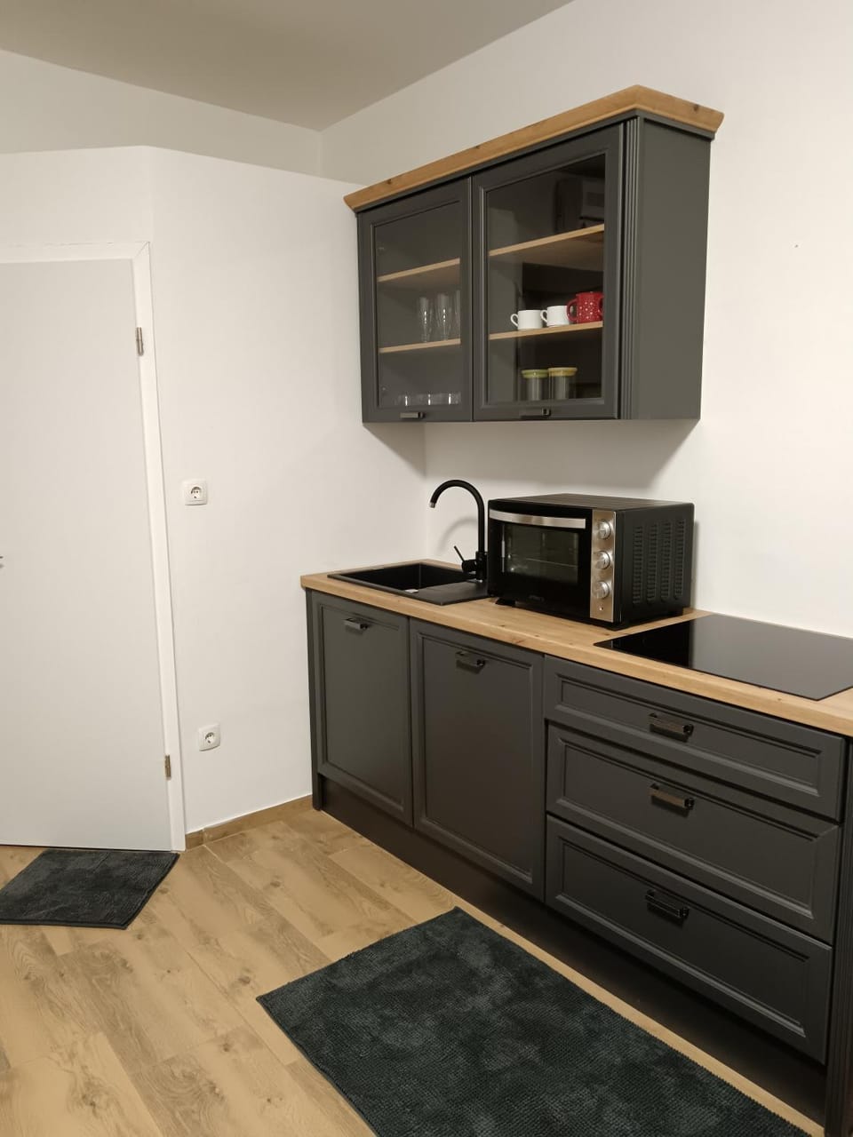 Kitchen or kitchenette, microwave