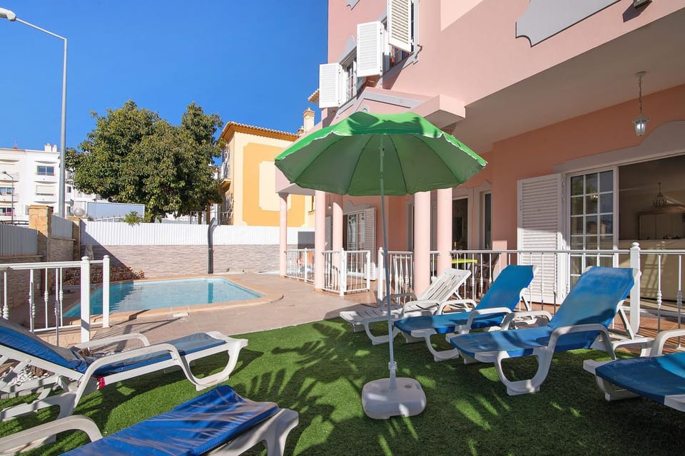 Property building, Living room, Swimming pool