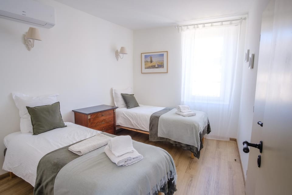 Bed, Photo of the whole room, Bedroom, towels, air conditioner