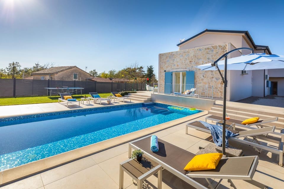 Property building, Garden, Table tennis, Seating area, Swimming pool