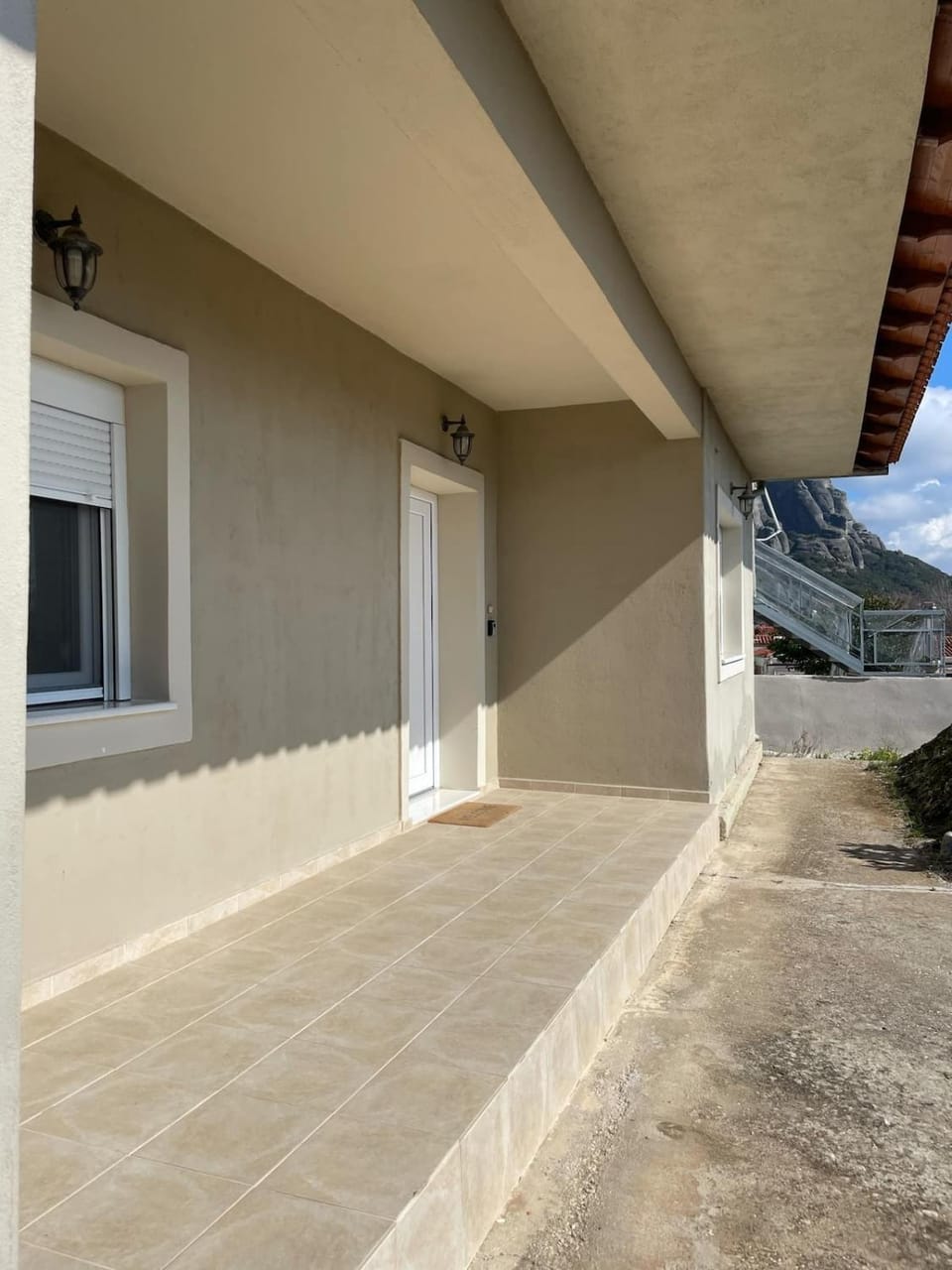 Rock in the yard Apartment in Kalabaka