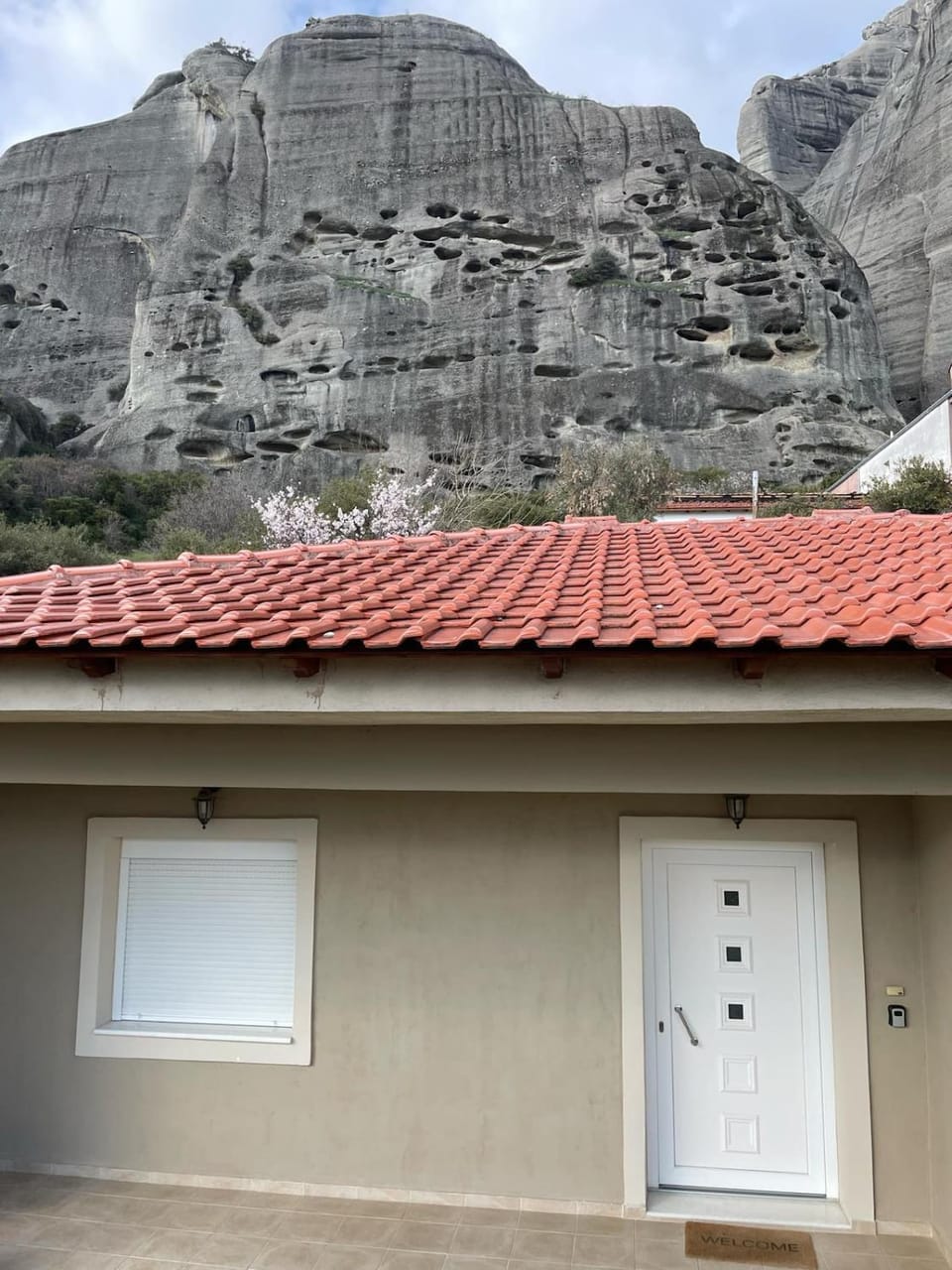 Rock in the yard Apartment in Kalabaka