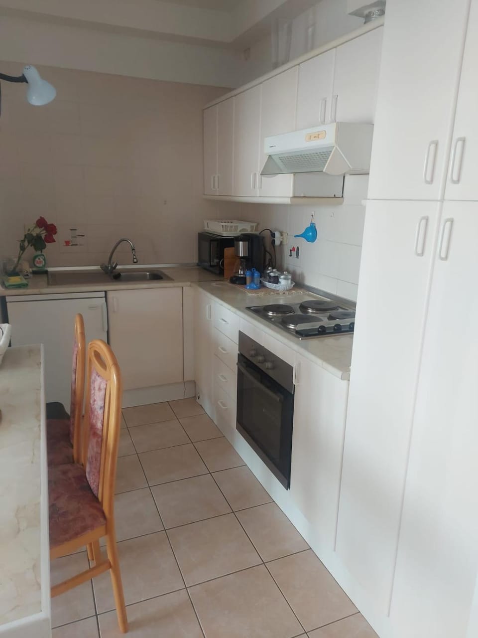 Kitchen or kitchenette, oven, stove