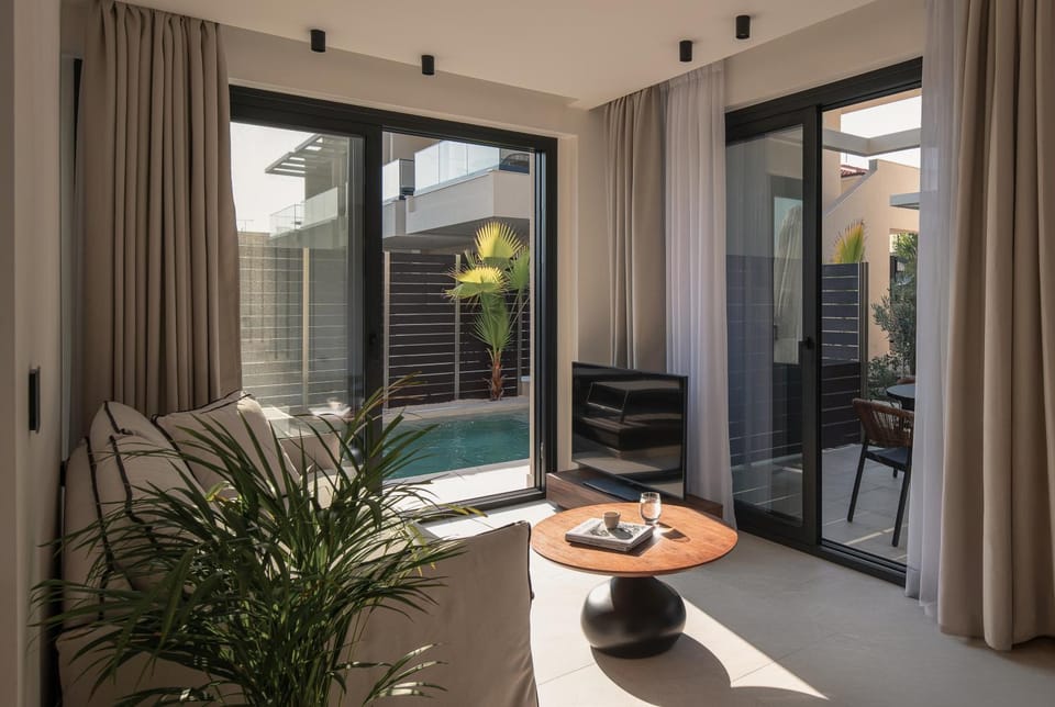 Living room, Seating area, Pool view