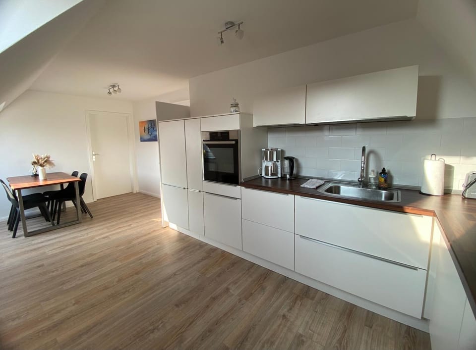Kitchen or kitchenette, Dining area, dishwasher, oven, stove, toaster