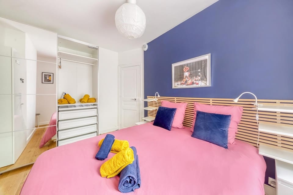 Bed, towels, wardrobe