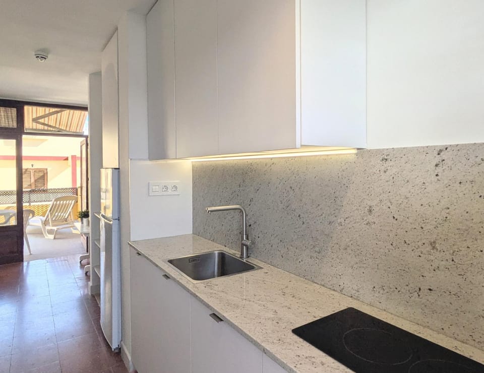 Kitchen or kitchenette, stove