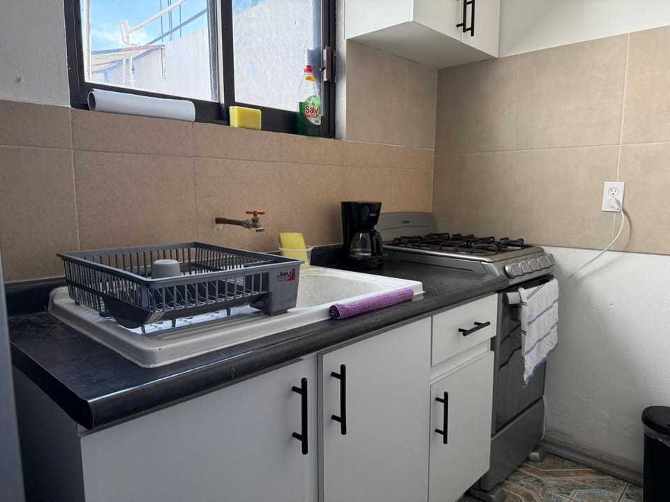 Kitchen or kitchenette, stove