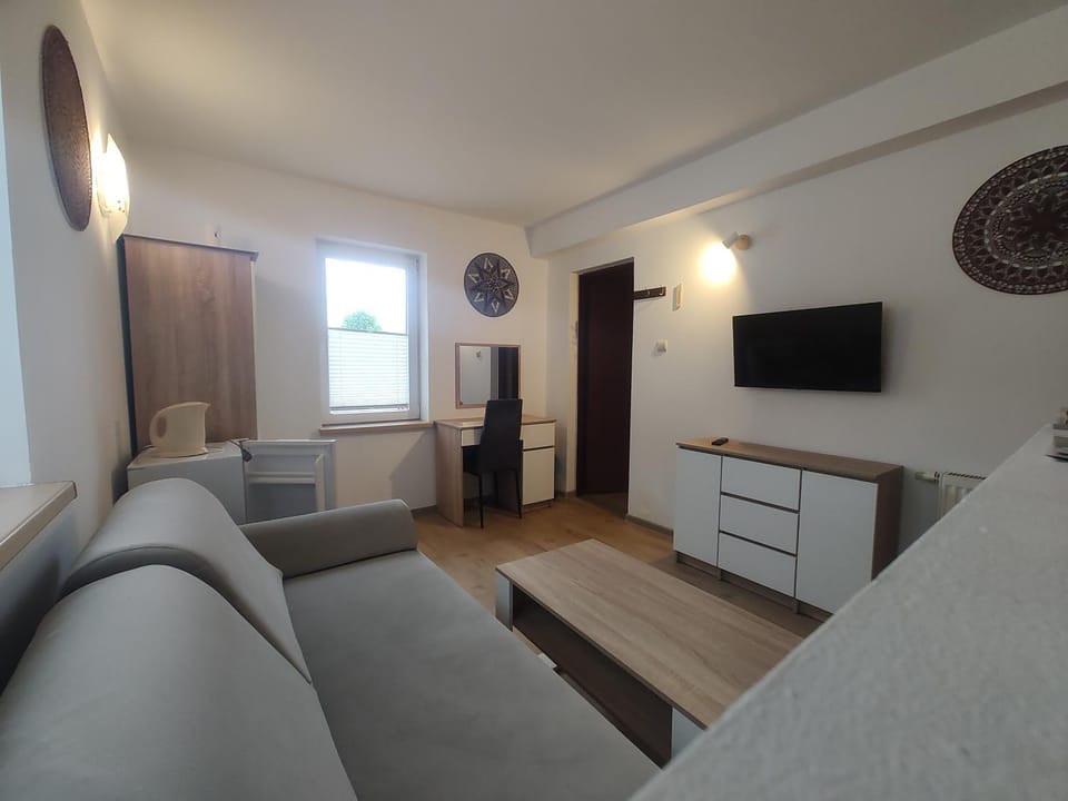 Bed, TV and multimedia, View (from property/room), Living room, locker