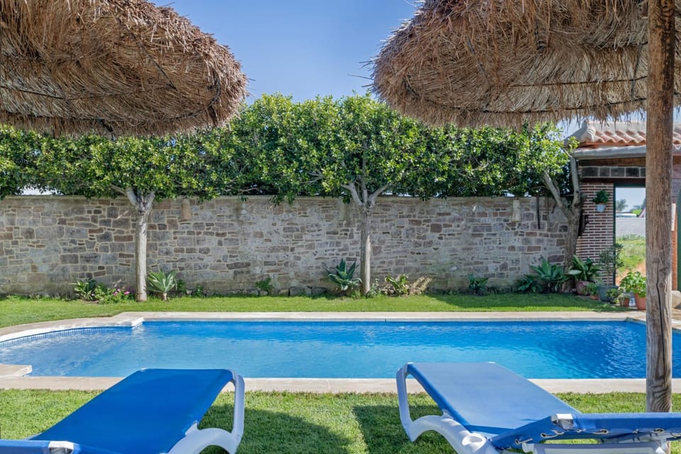 Property building, Living room, Swimming pool