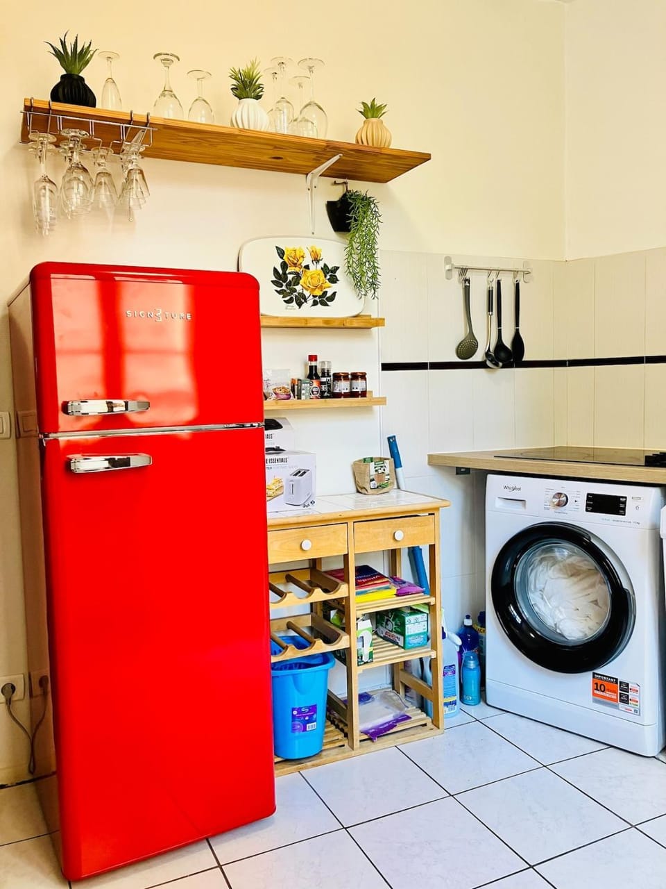 Kitchen or kitchenette, stove, washing machine, dryer
