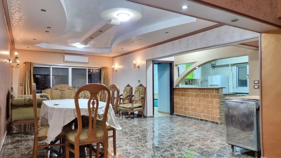 Kitchen or kitchenette, Living room, Seating area, Dining area, air conditioner