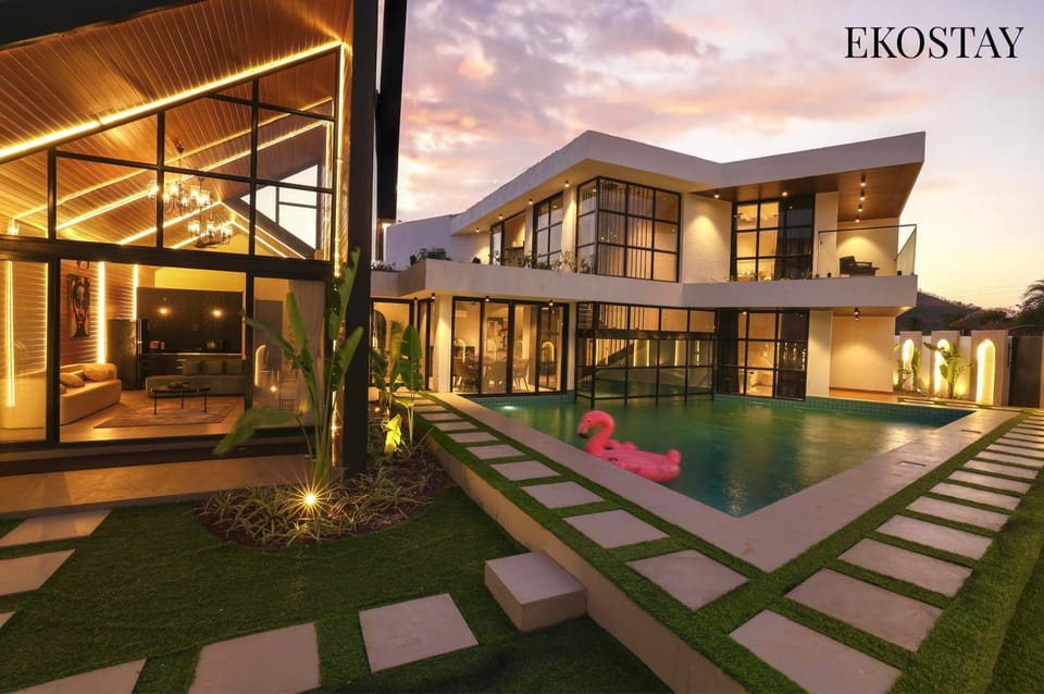 Property building, Patio, Day, Natural landscape, Text overlay, Pool view, Swimming pool, sunbed