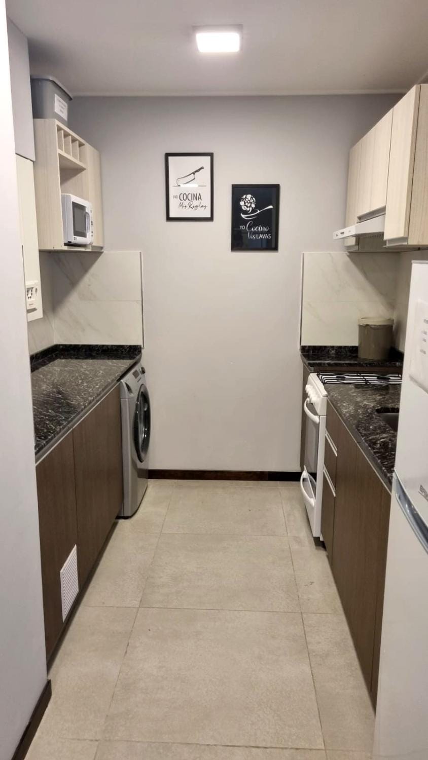 Kitchen or kitchenette, oven, washing machine