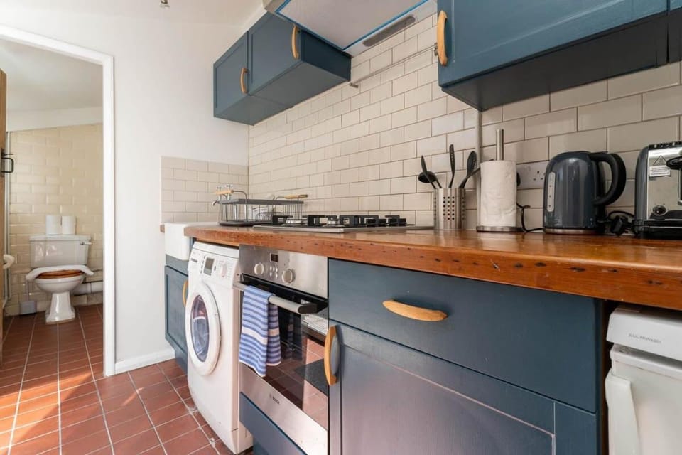 Kitchen or kitchenette, stove, toaster
