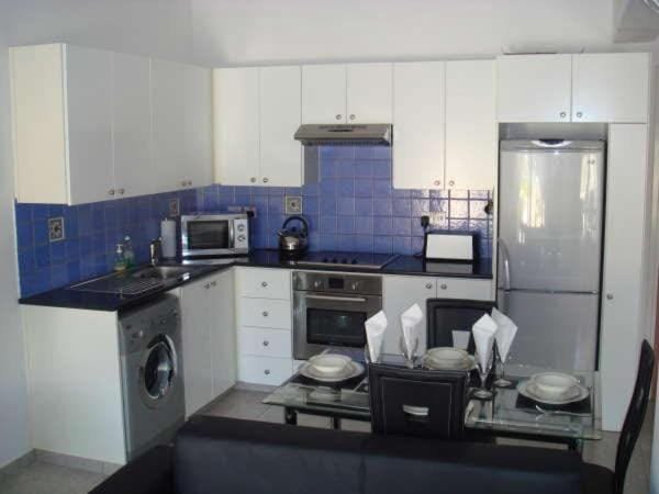 Kitchen or kitchenette, oven, toaster