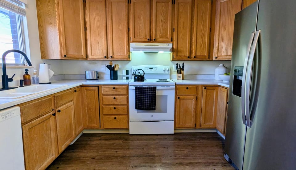 Kitchen or kitchenette, dishwasher, oven, stove, toaster