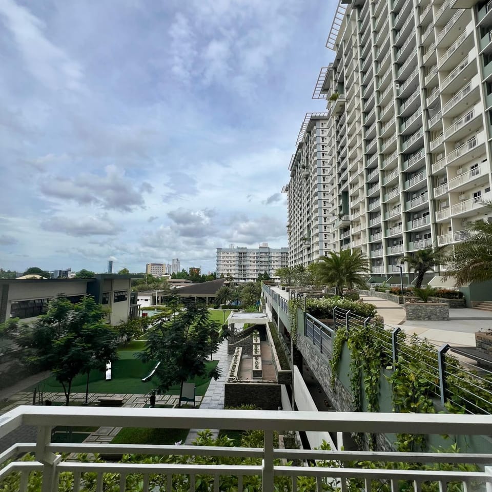 2br condo unit with two balconies that offer a picturesque ocean view and city skyline Apartment hotel in Davao City