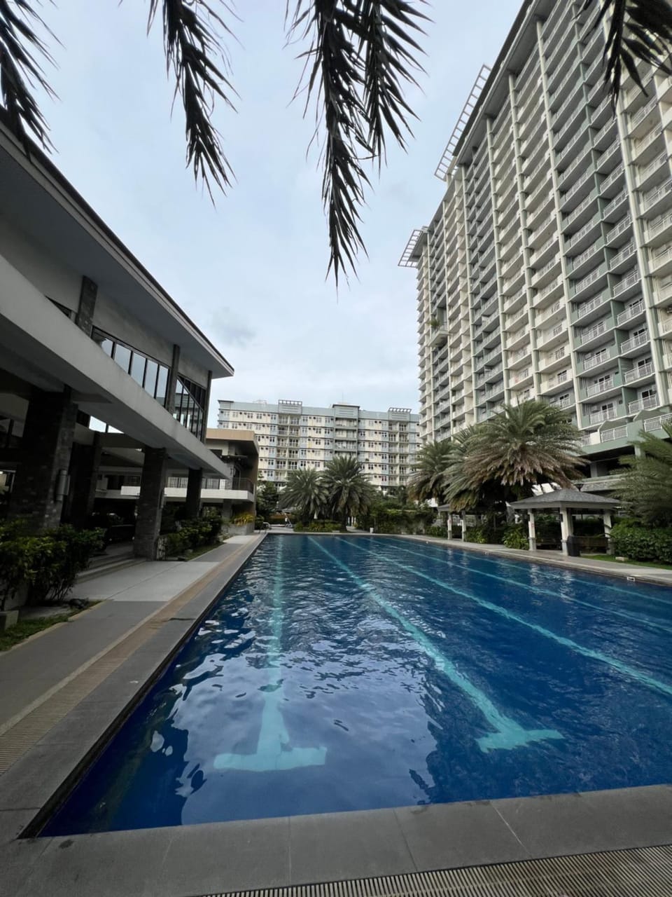 2br condo unit with two balconies that offer a picturesque ocean view and city skyline Apartment hotel in Davao City